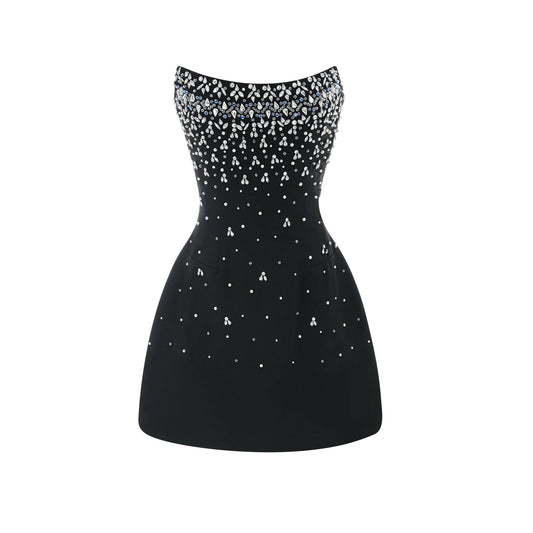 Black strapless dress with silver embellishments on a white background